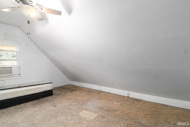 bonus room with vaulted ceiling, cooling unit, and ceiling fan