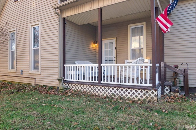 property entrance with covered porch