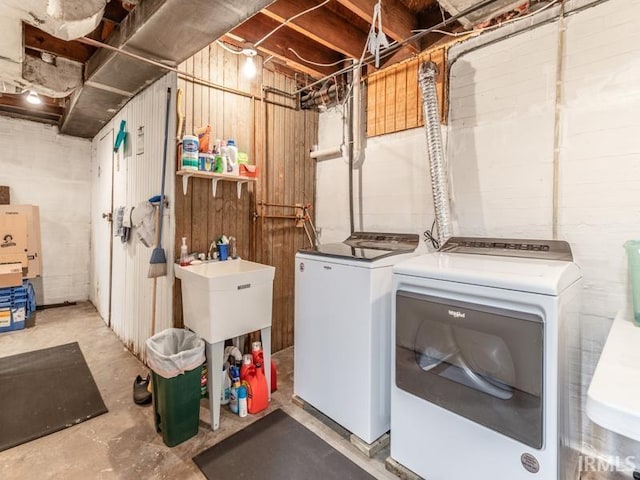 laundry room featuring separate washer and dryer