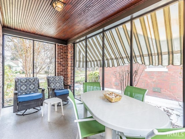 sunroom / solarium with wooden ceiling