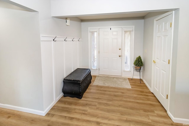 mudroom with light hardwood / wood-style floors