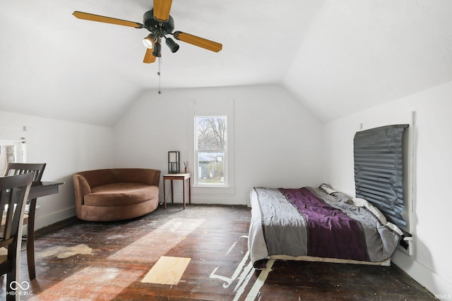 bedroom featuring ceiling fan, dark wood-type flooring, and vaulted ceiling