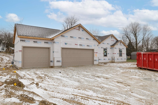 property under construction with a garage