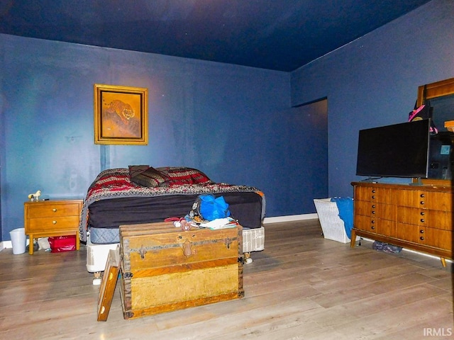 bedroom featuring hardwood / wood-style floors