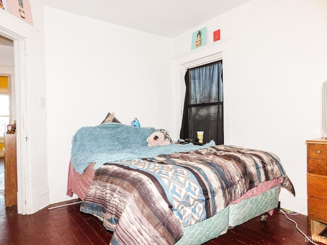 bedroom featuring dark hardwood / wood-style floors