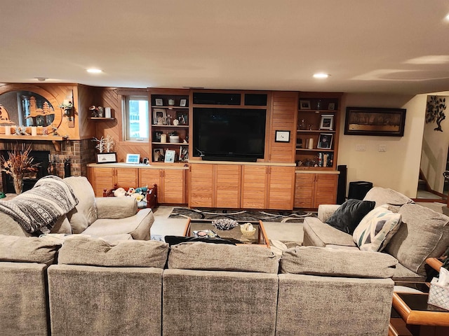 carpeted living room featuring a brick fireplace