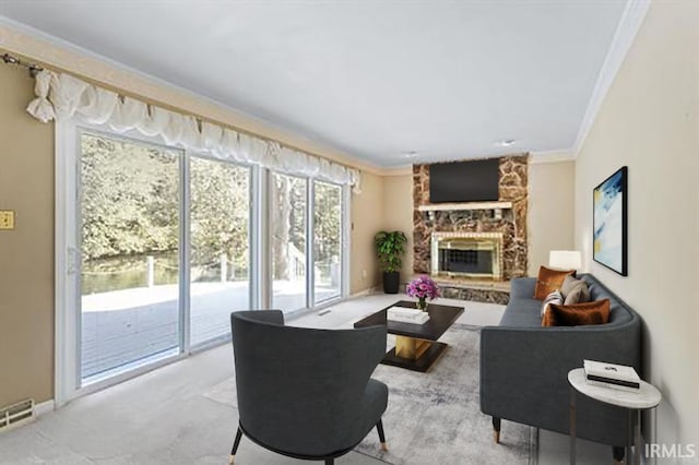 carpeted living room featuring a fireplace and ornamental molding