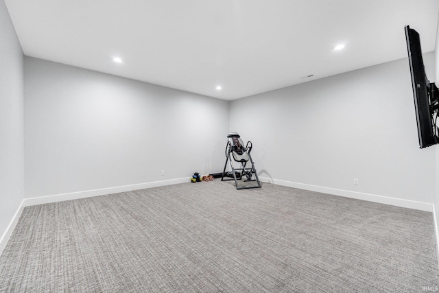 workout room featuring carpet