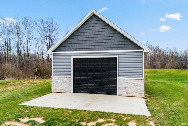 garage with a lawn