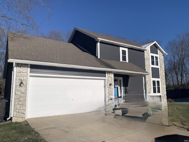 view of front of property featuring a garage