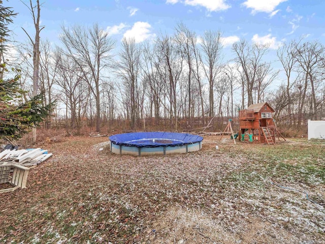 view of yard featuring a playground