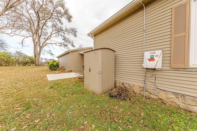 view of home's exterior with a yard