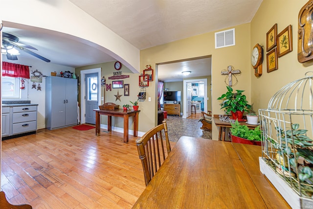 dining room featuring ceiling fan and light wood-type flooring