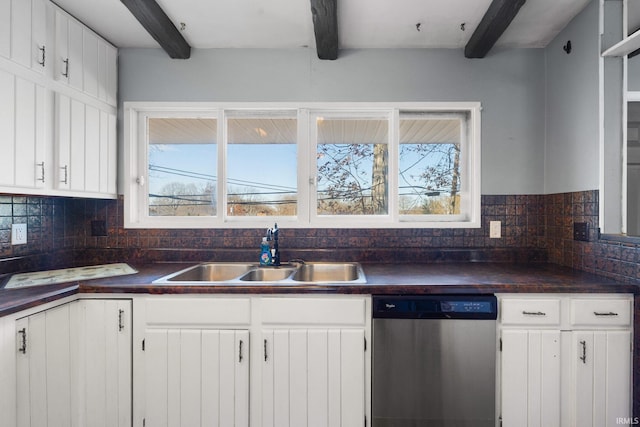 kitchen with stainless steel dishwasher, sink, and beamed ceiling