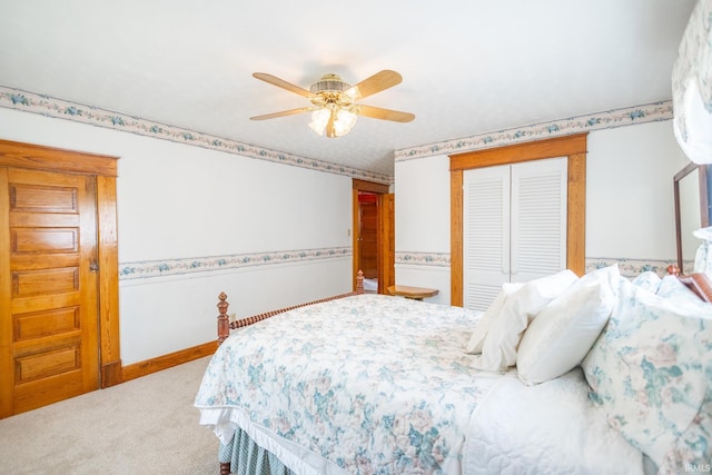 bedroom with carpet flooring, ceiling fan, and a closet