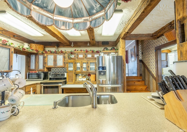 kitchen featuring sink and stainless steel appliances