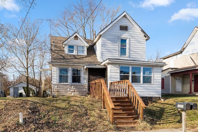 front facade with a front lawn