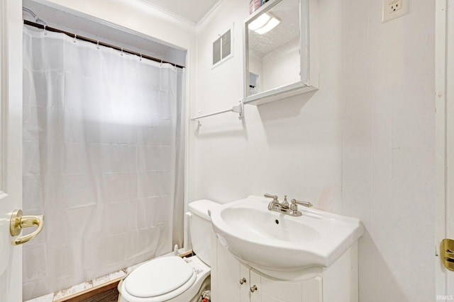 full bathroom featuring shower / bath combo, toilet, ornamental molding, and vanity