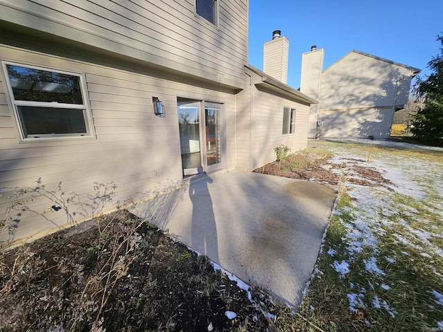 rear view of house with a patio area