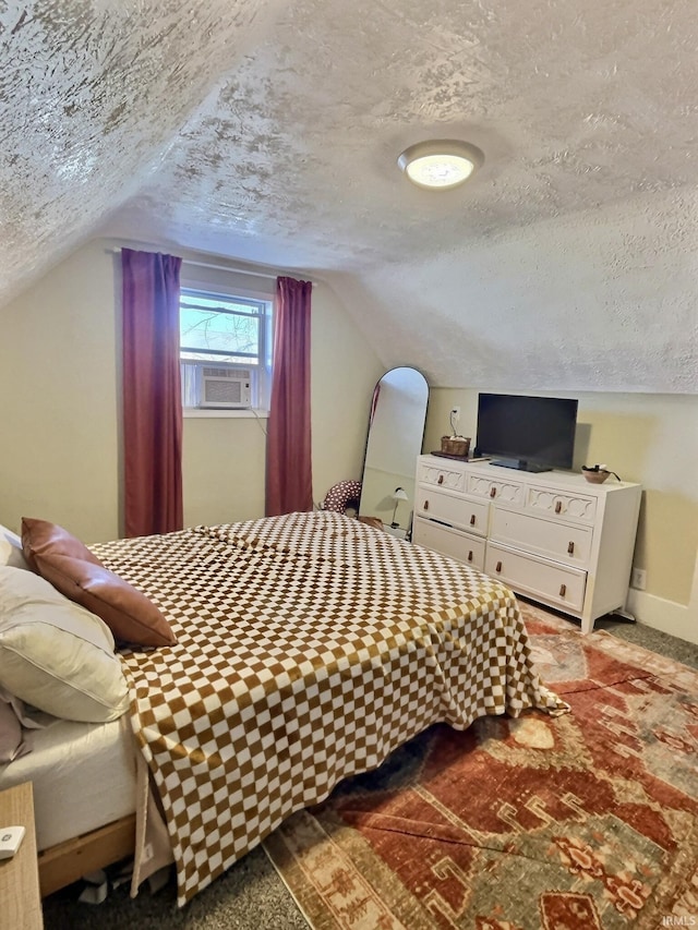 bedroom featuring carpet, cooling unit, lofted ceiling, and a textured ceiling