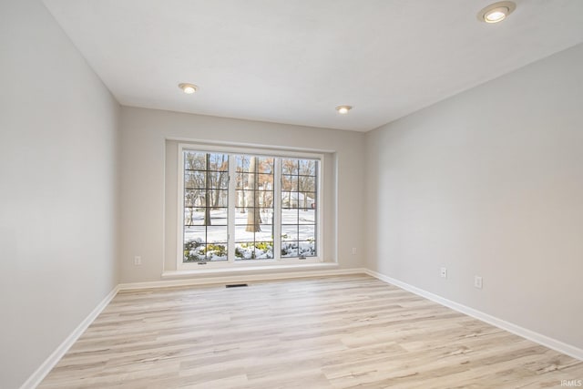 empty room featuring light wood-type flooring