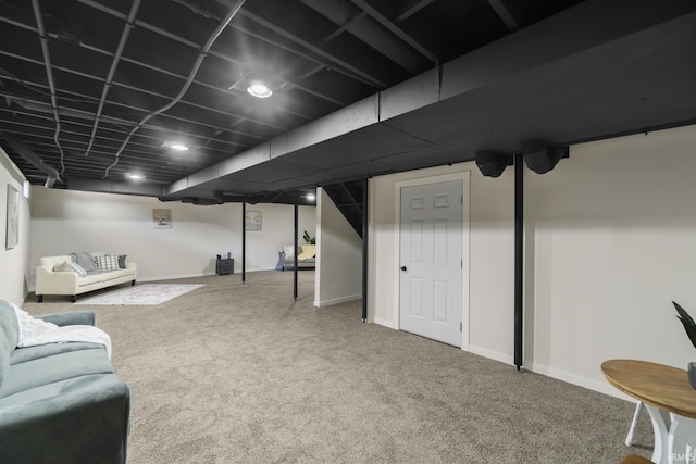 basement featuring carpet flooring