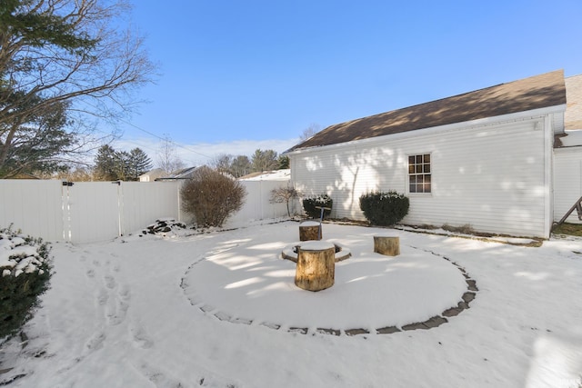 view of yard covered in snow