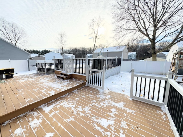 view of snow covered deck