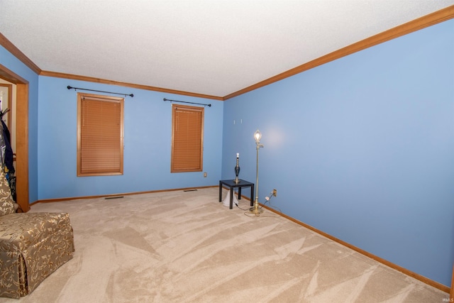 empty room with carpet floors and crown molding