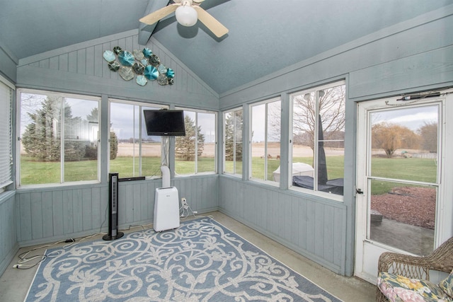 sunroom with vaulted ceiling, ceiling fan, and a healthy amount of sunlight