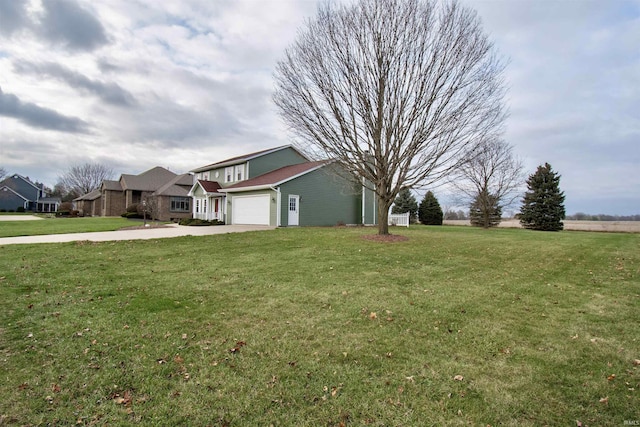 view of yard featuring a garage