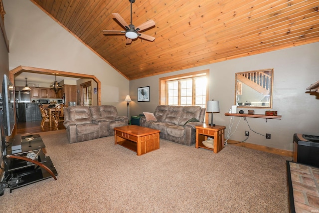 carpeted living room featuring ceiling fan, wooden ceiling, and high vaulted ceiling