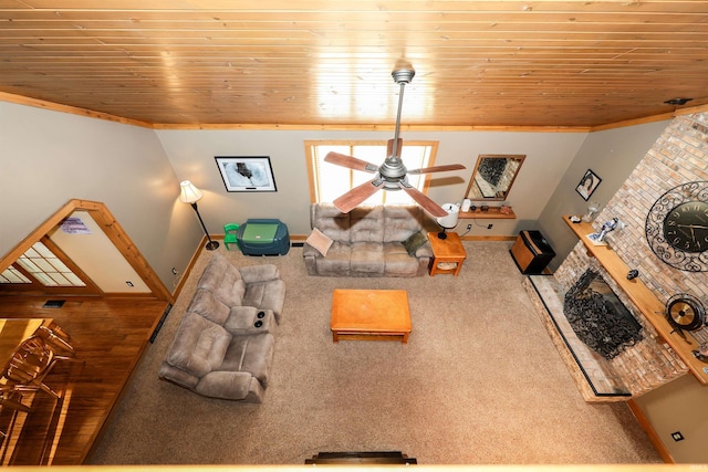 carpeted living room with ceiling fan and wooden ceiling