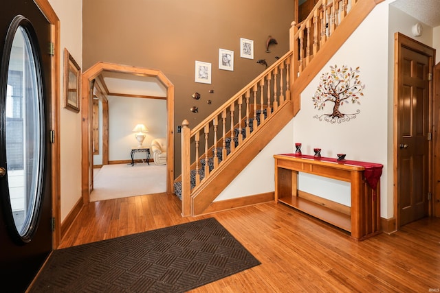 stairway with wood-type flooring