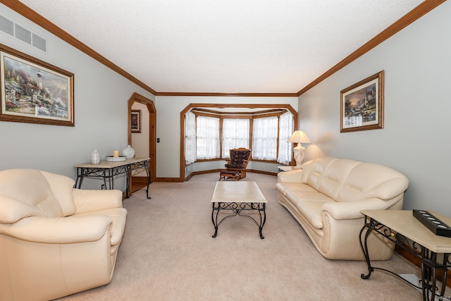 carpeted living room featuring ornamental molding