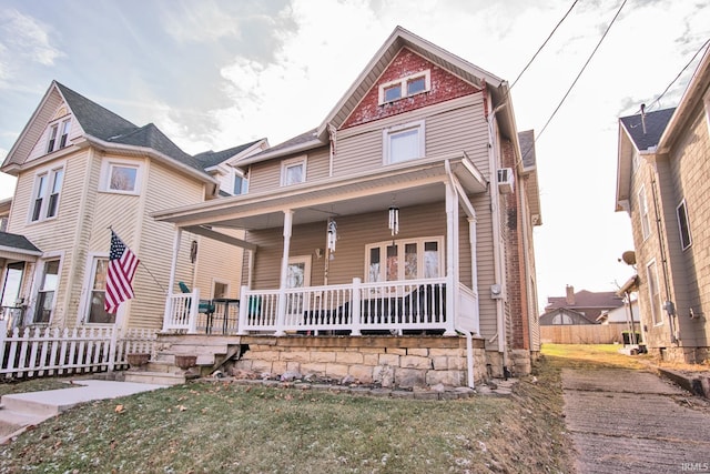 victorian home featuring covered porch