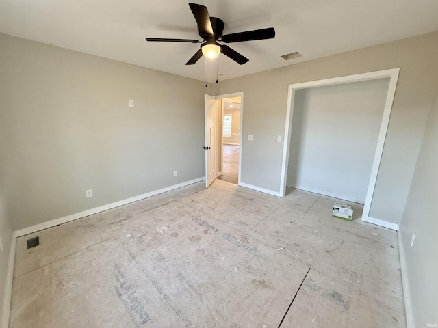 unfurnished bedroom featuring ceiling fan