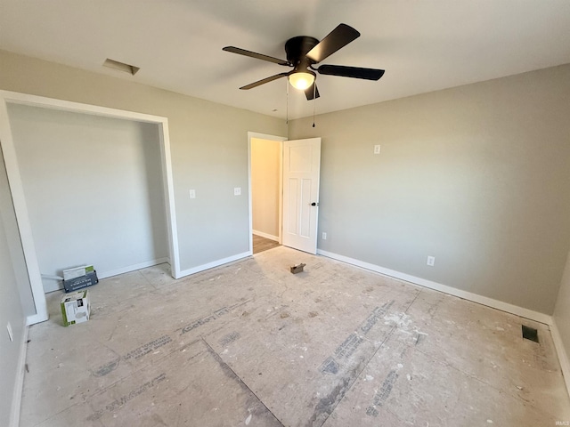 unfurnished bedroom featuring ceiling fan