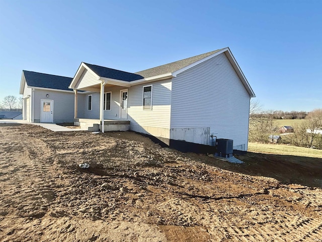 view of home's exterior with central AC unit