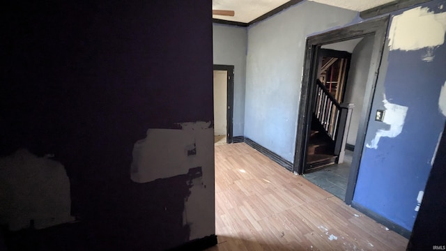 corridor featuring light hardwood / wood-style flooring