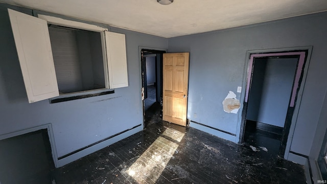 unfurnished bedroom featuring a closet