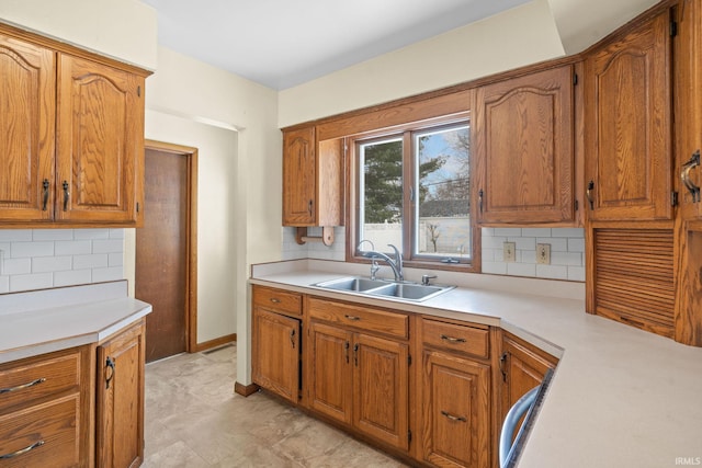 kitchen featuring backsplash and sink