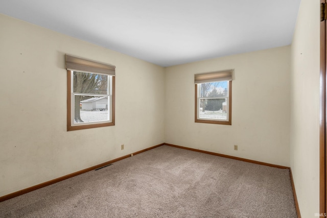 view of carpeted spare room