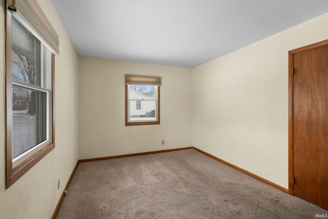 unfurnished room with carpet floors