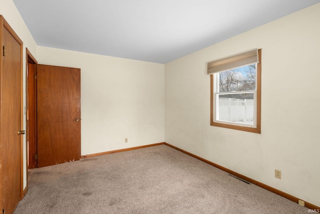 view of carpeted spare room