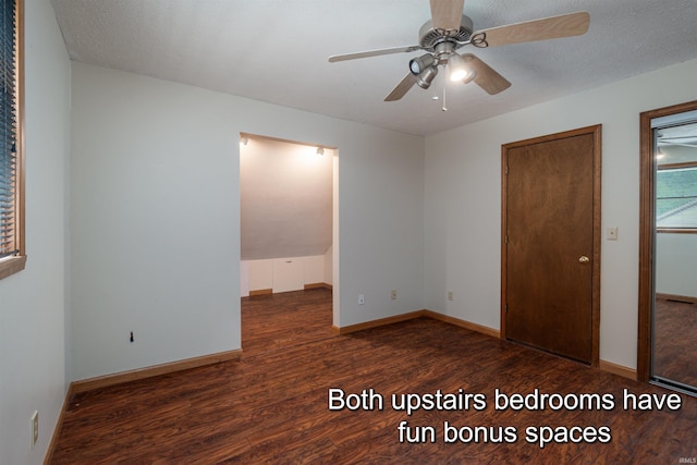 unfurnished bedroom featuring a textured ceiling, ceiling fan, and dark wood-type flooring