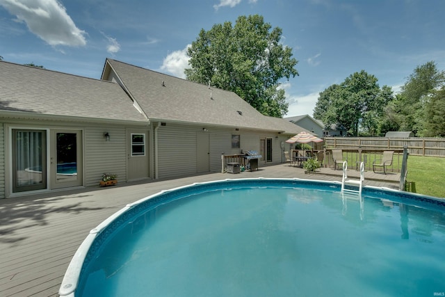 view of pool featuring a wooden deck