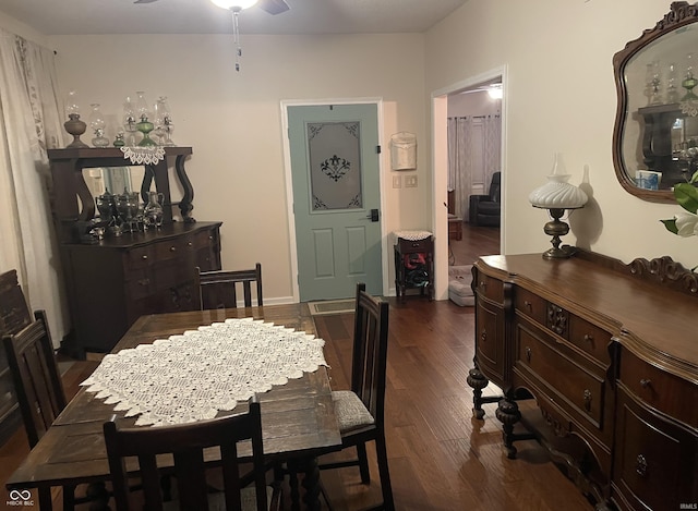 dining space featuring dark hardwood / wood-style floors and ceiling fan