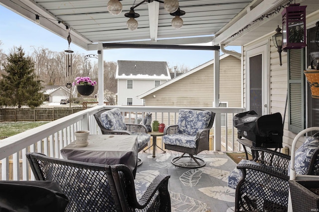 wooden deck featuring ceiling fan