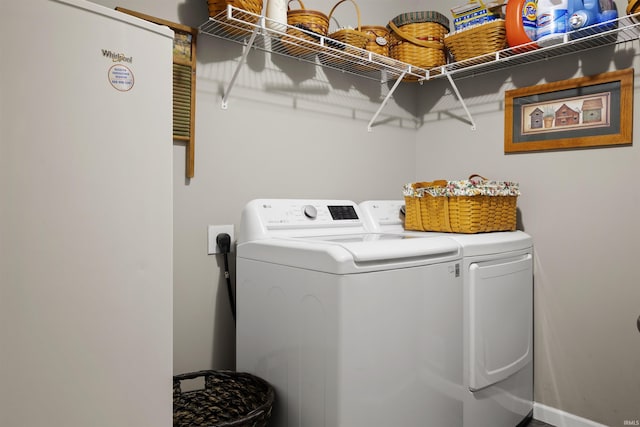 laundry area featuring washer and clothes dryer